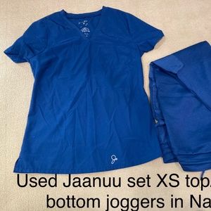 Used Jaanuu scrubs set in Navy